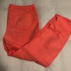 Bright neon pink skinny jeans